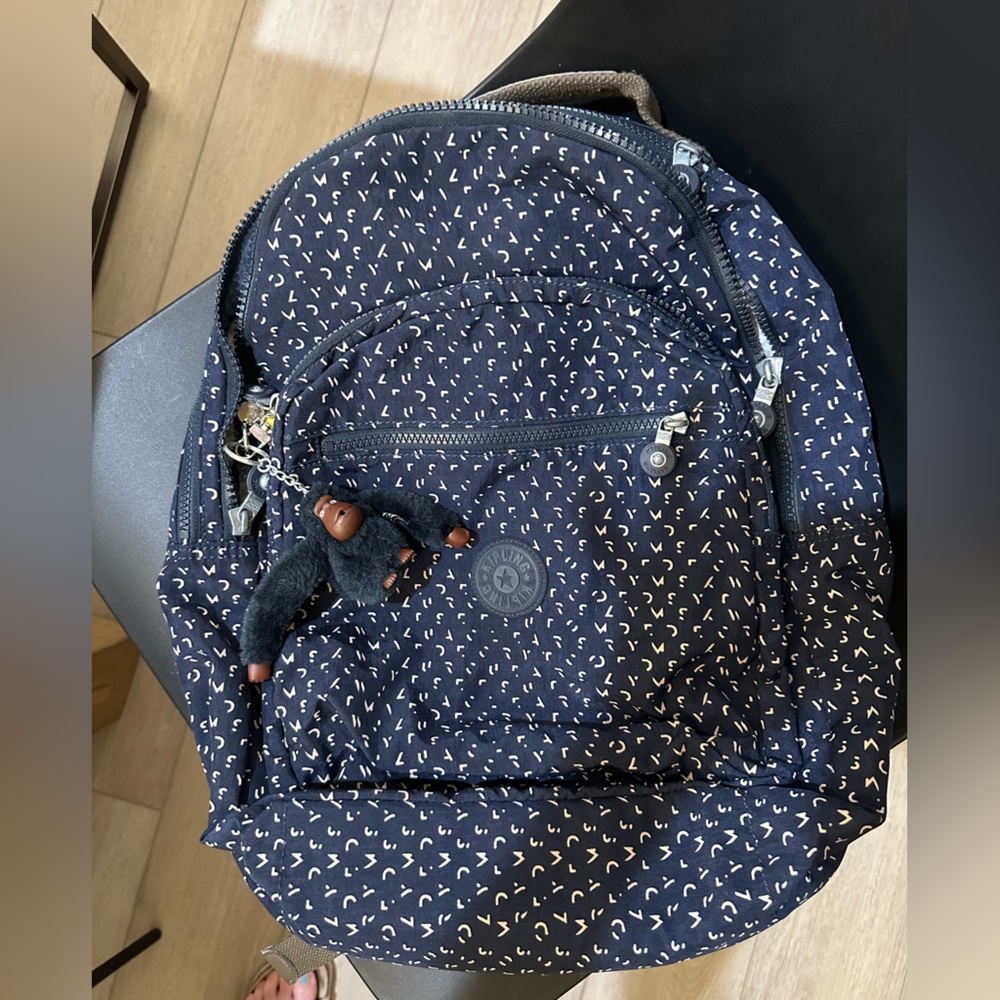 Kipling navy backpack with padded laptop sleeve and gorilla w/ banana key chain